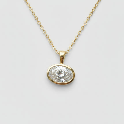 DIJE SOLITARIO DIAMANTE OVAL EN BISEL DE ORO