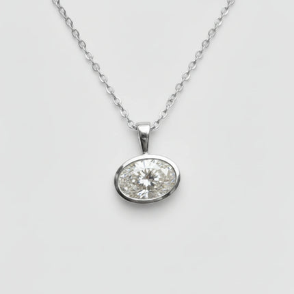 DIJE SOLITARIO DIAMANTE OVAL EN BISEL DE ORO