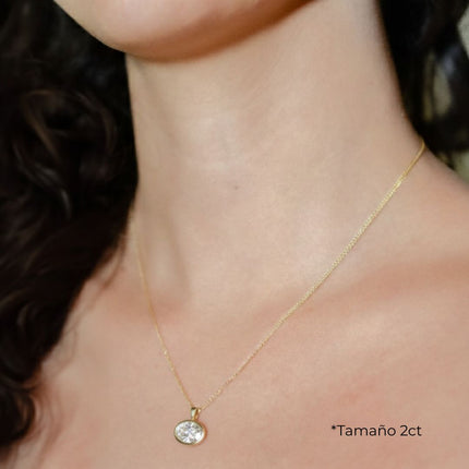 DIJE SOLITARIO DIAMANTE OVAL EN BISEL DE ORO